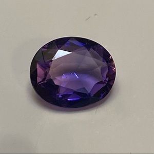 Approximately 10 x 12 mm oval Amethyst Gemstone